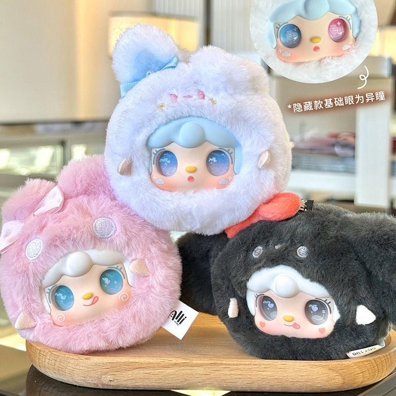 Trio de figurines mystères Yooki Cutely Rabbit dans les coloris bleu, noir et rose pastel